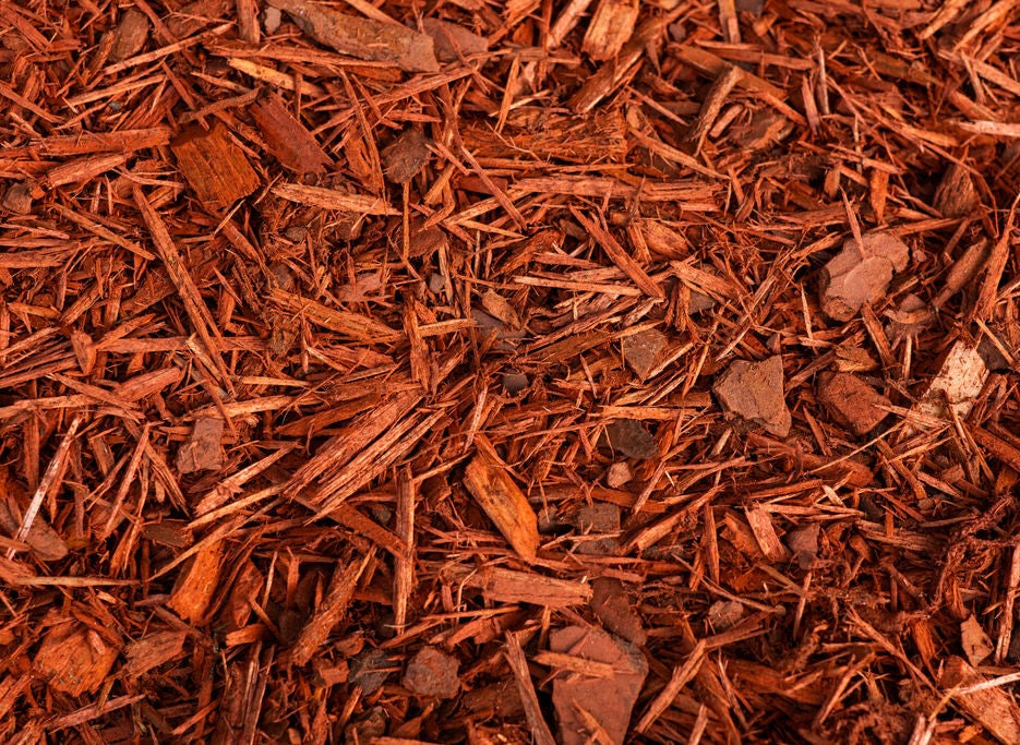 Bulk red mulch for flower beds and landscaping delivery in Picayune, Waveland, Bay St. Louis, and Slidell